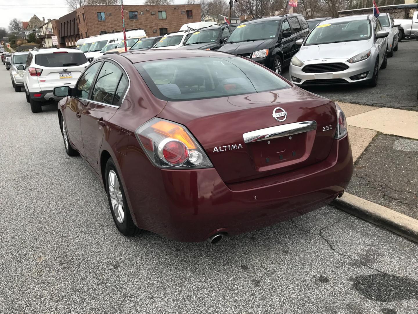 2010 Maroon /Gray Nissan Altima 2.5 (1N4AL2APXAN) , Automatic transmission, located at 577 Chester Pike, Prospect Park, PA, 19076, (610) 237-1015, 39.886154, -75.302338 - Photo#5